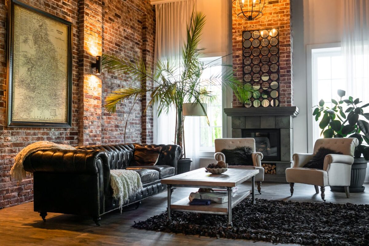 service-01 Cozy living room with industrial design featuring brick walls, classic furniture, and chic decor.